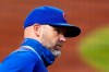 Chicago Cubs manager David Ross stands in the dugout during the first inning of the team's baseball game against the Pittsburgh Pirates in Pittsburgh, Wednesday, Sept. 23, 2020. (AP Photo/Gene J. Puskar)