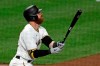 Pittsburgh Pirates' Colin Moran watches his solo home run off Milwaukee Brewers relief pitcher Devin Williams during the seventh inning of a baseball game in Pittsburgh, Monday, July 27, 2020. It was Moran's second home run of the game. (AP Photo/Gene J. Puskar)