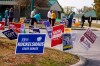 Voters wait in line to cast their ballot in the 2020 Presidential election during early voting in Noblesville, Ind.Wednesday, Oct. 14, 2020. (AP Photo/Michael Conroy, File)