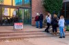 Voters wait in line outside the Bucks county government building in Doylestown, Pa., a suburb of Philadelphia, on Monday, Nov. 2, 2020. Some said they received word that their mail-in ballots had problems and needed to be fixed in order to count. (AP Photo/Mike Catalini)