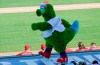 FILE - In this Feb. 23, 2020, file photo, the Phillie Phanatic mascot walks on the third-base dugout while the Philadelphia Phillies played the Pittsburgh Pirates in a spring training baseball game in Clearwater, Fla. Mascots are getting a reprieve from Major League Baseball. A month after being tossed out because of health concerns, they're again poised to become inside-the-parkers. (Yong Kim/The Philadelphia Inquirer via AP, File)