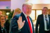 U.S. President Donald Trump waves as he arrives at the World Economic Forum in Davos, Switzerland, Wednesday, Jan. 22, 2020. The 50th annual meeting of the forum is taking place in Davos from Jan. 21 until Jan. 24, 2020. (AP Photo/Markus Schreiber)