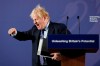 British Prime Minister Boris Johnson outlines his government's negotiating stance with the European Union after Brexit, during a key speech at the Old Naval College in Greenwich, London, Monday, Feb. 3, 2020. (AP Photo/Frank Augstein, Pool)