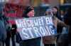 JOHN WOODS / WINNIPEG FREE PRESS
People gather at Portage and Main and other locations in downtown Winnipeg to shut down traffic in solidarity with Wet’suwet’en in BC Monday.