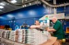 In this April 11, 2018, photo, production workers stack newspapers onto a cart at the Janesville Gazette Printing & Distribution plant in Janesville, Wis. The federal government needs to move quickly to support the Canadian news industry amid the economic downturn brought about by the response to the COVID-19 pandemic, an industry spokesman said Monday. THE CANADIAN PRESS/Angela Major/The Janesville Gazette via AP