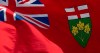 Ontario's provincial flag flies on a flag pole in Ottawa, Tuesday June 30, 2020. Ontario is reporting 118 new cases of COVID-19, and nine new deaths due to the novel coronavirus. THE CANADIAN PRESS/Adrian Wyld