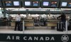 Air Canada passengers check in at the Vancouver International Airport on June 17, 2008. Air Canada has quietly changed its refund policy to allow some customers whose flights were cancelled due to the COVID-19 pandemic to recoup their cash. THE CANADIAN PRESS/Darryl Dyck