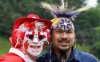 Greg Sturm (left) poses with native dancer Barry Albert during a Canada Day celebration, Monday, July 1, 2013 in London, Ont. Indigenous communities and leaders are sharing their Canada Day frustrations. THE CANADIAN PRESS//Dave Chidley