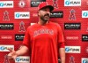 Los Angeles Angels pitching coach Mickey Callaway speaks about his philosophies outside the clubhouse at Tempe Diablo Stadium in Tempe, Ariz., on Friday, Feb. 14, 2020. After his difficult two-year tenure as the New York Mets' manager ended last fall, Callaway says he is energized by his return to a familiar role as he becomes a key assistant to new Angels manager Joe Maddon. (AP Photo/Greg Beacham)