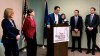 Dr. Benjamin Chan, New Hampshire's state epidemiologist, announces the state's first case of the new COVID-19 virus on Monday, March 2, 2020, in Concord, N.H. Chan was joined at the news conference by members of the state's Congressional delegation, from left: U.S. Sen. Maggie Hassan, U.S. Sen. Jeanne Shaheen, Chan, U.S. Rep. Annie Kuster, U.S. Rep. Chris Pappas, and Gov. Chris Sununu. (AP Photo/Holly Ramer)