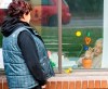 Annette Demeny, left, visits through the window with her friend Concetta Lamberto at the Vigi Mount Royal seniors residence Friday May 1, 2020 in Montreal North. The area has been identified as one of the hardest hit with COVID-19 on the island. THE CANADIAN PRESS/Ryan Remiorz