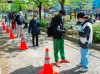 People line up at a mobile COVID-19 testing clinic, Tuesday May 19, 2020 in Montreal.THE CANADIAN PRESS/Ryan Remiorz