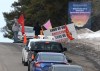 Protesters let vehicles past a check point on a highway in Kanesatake Mohawk Territory, near Oka, Que. on Tuesday, Feb. 25, 2020, as they protest in solidarity with Wet'suwet'en Nation hereditary chiefs attempting to halt construction of a natural gas pipeline on their traditional territories. THE CANADIAN PRESS/Ryan Remiorz