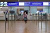 A girl wearing a mask skips rope at Incheon International Airport in Incheon, South Korea, Monday, Jan. 27, 2020. China on Monday expanded sweeping efforts to contain a viral disease by extending the Lunar New Year holiday to keep the public at home and avoid spreading infection. (AP Photo/Ahn Young-joon)