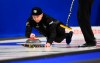 Team Wild Card skip Mike McEwen throws as he takes on Team Yukon at the Brier in Kingston, Ont., on Sunday, March 1, 2020. THE CANADIAN PRESS/Sean Kilpatrick