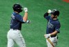 Tampa Bay Rays' Austin Meadows (17) celebrates his solo home run off Boston Red Sox starter Nathan Eovaldi with Brandon Lowe during the first inning of a baseball game Saturday, Sept. 12, 2020, in St. Petersburg, Fla. (AP Photo/Steve Nesius)