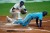 Toronto Blue Jays' Cavan Biggio (8) gets tagged out by Tampa Bay Rays relief pitcher Peter Fairbanks after trying to score from second base on a wild pitch by Fairbanks during the seventh inning of a baseball game Saturday, Aug. 22, 2020, in St. Petersburg, Fla. (AP Photo/Chris O'Meara)