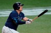 Tampa Bay Rays' Ji-Man Choi, of South Korea, watches his run-scoring sacrifice fly off Baltimore Orioles relief pitcher Travis Lakins Sr., during the sixth inning of a baseball game Tuesday, Aug. 25, 2020, in St. Petersburg, Fla. Rays' Hunter Renfroe scored on the play. (AP Photo/Chris O'Meara)