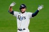 Tampa Bay Rays' Austin Meadows celebrates his RBI double off Boston Red Sox relief pitcher Ryan Weber during the fifth inning of a baseball game Thursday, Sept. 10, 2020, in St. Petersburg, Fla. Rays' Manuel Margot scored on the hit. (AP Photo/Chris O'Meara)