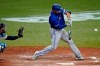 Toronto Blue Jays' Randal Grichuk prepares to connect on a three-run home run off Tampa Bay Rays relief pitcher Aaron Loup during the seventh inning of a baseball game Monday, Aug. 24, 2020, in St. Petersburg, Fla. Catching for the Rays is Mike Zunino. (AP Photo/Chris O'Meara)