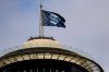 CP
A flag with the logo for the Seattle Kraken flies atop the Space Needle in Seattle. (Elaine Thompson / The Associated Press files)