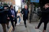 British television host Piers Morgan speaks to reporters outside his home in Kensington, central London, as he walks his daughter Elise to school on Wednesday March 10, 2021. Morgan quit the “Good Morning Britain” program on Tuesday after making controversial comments about the Duchess of Sussex. The U.K.’s media watchdog said earlier Tuesday it was launching an investigation into the show under its harm and offense rules after receiving more than 41,000 complaints about Morgan’s comments on Meghan. (Jonathan Brady/PA via AP)