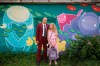 Vonny Sweetland and his sister, who he is a guardian for, Josephine Price, 12, pose for a photograph at Wychwood Barns Park in Toronto, on Saturday, August 15, 2020. Vonny Sweetland has yet to decide if he will be sending his 12-year-old sister Josephine back to class in September, but just in case he does, he's been stocking up on supplies for months. THE CANADIAN PRESS/ Tijana Martin