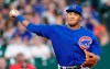 FILE - In this May 29, 2019, file photo, then Chicago Cubs shortstop Addison Russell throws to first during the eighth inning of a baseball game against the Houston Astro in Houston. Former Chicago Cubs All-Star shortstop Russell will look to rebuild his career abroad after he signed a one-year, $530,000 contract with the Kiwoom Heroes of the Korean Baseball Organization. (AP Photo/David J. Phillip, File)