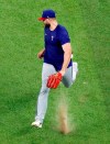Texas Rangers outfielder Joey Gallo tries to field a fly ball on the hop during a 