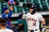 Houston Astros' Aledmys Diaz (16) celebrates after hitting a three-run home run against the Texas Rangers during the first inning of a baseball game Thursday, Sept. 3, 2020, in Houston. (AP Photo/David J. Phillip)