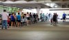 Shoppers line up outside of Costco before it opens in Houston on Monday, Aug. 24, 2020. ( Elizabeth Conley/Houston Chronicle via AP)
