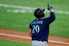 Seattle Mariners' Daniel Vogelbach (20) celebrates his two-run home run as he approaches home plate in the second inning of a baseball game against the Texas Rangers in Arlington, Texas, Wednesday, Aug. 12, 2020. The shot scored Shed Long Jr. (AP Photo/Tony Gutierrez)