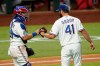 Texas Rangers catcher Jose Trevino and relief pitcher Nick Goody celebrate after the team's 7-1 win in a baseball game against the Los Angeles Angels in Arlington, Texas, Tuesday, Sept. 8, 2020. (AP Photo/Tony Gutierrez)