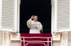 CP
Pope Francis waves as he leaves after the Angelus noon prayer from the window of his studio overlooking St.Peter's Square, at the Vatican, Sunday, Oct. 3, 2021. (AP Photo/Alessandra Tarantino)