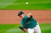 Seattle Mariners starting pitcher Nick Margevicius throws against the Texas Rangers in the second inning of a baseball game Friday, Aug. 21, 2020, in Seattle. (AP Photo/Elaine Thompson)