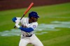 Seattle Mariners' Kyle Lewis begins his swing on a solo home run against the Texas Rangers during the first inning of a baseball game, Sunday, Aug. 23, 2020, in Seattle. (AP Photo/Ted S. Warren)