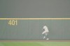 Seattle Mariners center fielder Kyle Lewis prepares to throw the ball back to the infield after making a catch as the air is filled with wildfire smoke during the first baseball game of a doubleheader against the Oakland Athletics, Monday, Sept. 14, 2020, in Seattle. (AP Photo/Ted S. Warren)