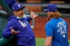 Los Angeles Dodgers manager Dave Roberts talks with third baseman Justin Turner during batting practice before Game 2 of the baseball World Series against the Tampa Bay Rays Wednesday, Oct. 21, 2020, in Arlington, Texas. (AP Photo/Sue Ogrocki)