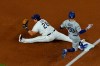Tampa Bay Rays first baseman Ji-Man Choi forces Los Angeles Dodgers' Mookie Betts out at first during the first inning in Game 3 of the baseball World Series Friday, Oct. 23, 2020, in Arlington, Texas. (AP Photo/David J. Phillip)