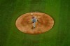Los Angeles Dodgers starting pitcher Clayton Kershaw throws against the Tampa Bay Rays during the first inning in Game 5 of the baseball World Series Sunday, Oct. 25, 2020, in Arlington, Texas. (AP Photo/David J. Phillip)