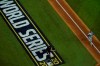 Los Angeles Dodgers first baseman Max Muncy celebrates a home run against the Tampa Bay Rays during the fifth inning in Game 5 of the baseball World Series Sunday, Oct. 25, 2020, in Arlington, Texas.(AP Photo/David J. Phillip)