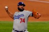 Los Angeles Dodgers relief pitcher Kenley Jansen throws against the Tampa Bay Rays during the ninth inning in Game 3 of the baseball World Series Friday, Oct. 23, 2020, in Arlington, Texas. (AP Photo/Tony Gutierrez)