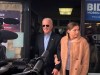 Democratic presidential candidate former Vice President Joe Biden walks out of his campaign field office, Monday, Feb. 3, 2020, in south Des Moines, Iowa, with his granddaughter Finnegan Biden. (AP Photo/Bill Barrow)