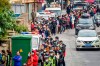 In this Jan. 29, 2020 photo, people line up to buy face masks from a medical supply company in Nanning in southern China's Guangxi Zhuang Autonomous Region. (Chinatopix via AP)