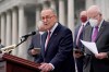 FILE - In this Oct. 22, 2020, file photo Senate Minority Leader Chuck Schumer, D-N.Y., and Democratic members of the Senate Judiciary Committee hold a news conference after boycotting the vote by the Republican-led panel to advance the nomination of Judge Amy Coney Barrett to sit on the Supreme Court at the Capitol in Washington. Schumer, will be majority leader once the two new Georgia senators and Vice President-elect Kamala Harris are all sworn into office, and will have the opportunity to bring legislation to the floor and force votes. (AP Photo/J. Scott Applewhite, File)