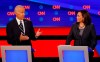 FILE - In this July 31, 2019, file photo, then-Democratic presidential candidate Sen. Kamala Harris, D-Calif., listens as Democratic presidential candidate former Vice President Joe Biden speaks during a Democratic presidential primary debate at the Fox Theatre in Detroit. Democratic presidential candidate former Vice President Joe Biden has chosen Harris as his running mate. (AP Photo/Paul Sancya, File)