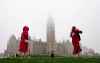 CP
Fog shrouds the Peace Tower as people walk on Parliament Hill in Ottawa on Thursday, Oct. 11, 2018. THE CANADIAN PRESS/Justin Tang