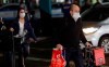 Passengers wearing masks as a precaution against the spread of the new coronavirus COVID-19 arrive to the Sao Paulo International Airport in Sao Paulo, Brazil, Wednesday, Feb. 26, 2020. (AP Photo/Andre Penner)