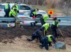 RCMP investigators search for evidence at the location where Const. Heidi Stevenson was killed along the highway in Shubenacadie, N.S. on Thursday, April 23, 2020. Police say the man who went on a murderous rampage through five Nova Scotia communities was likely using unlicensed firearms, and investigators are trying find out how he obtained illegal weapons. THE CANADIAN PRESS/Andrew Vaughan