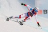 Switzerland's Corinne Suter competes in an alpine ski, women's World Cup downhill, in Crans Montana, Switzerland, Friday, Feb. 21, 2020. (AP Photo/Alessandro Trovati)